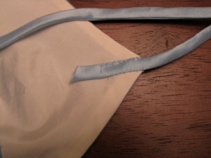 Securing the front of a spaghetti strap